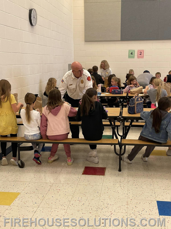 Chief Cluchey educating students at Fun Lunch