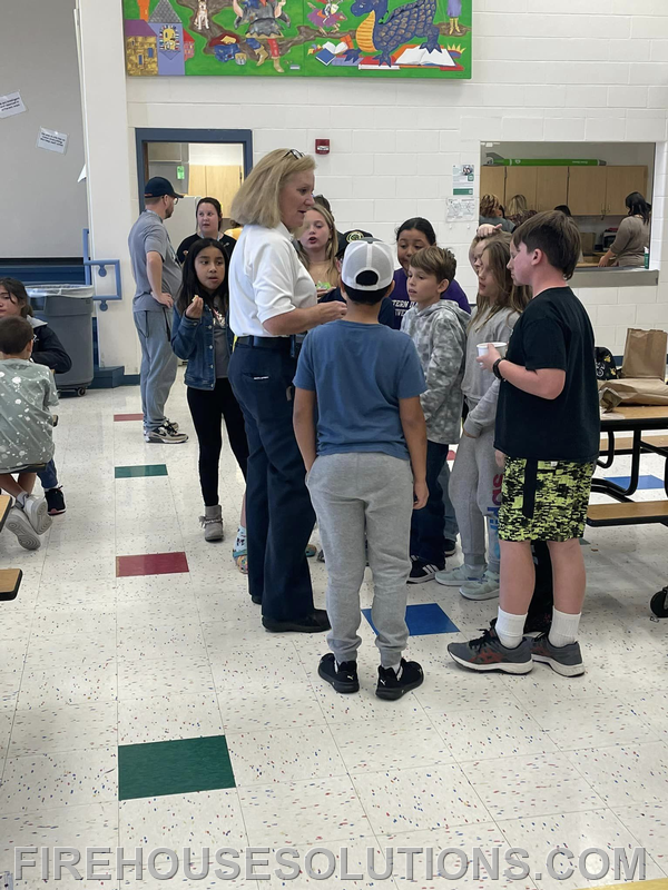 Fire Marshal Schopp educating students at Fun Lunch